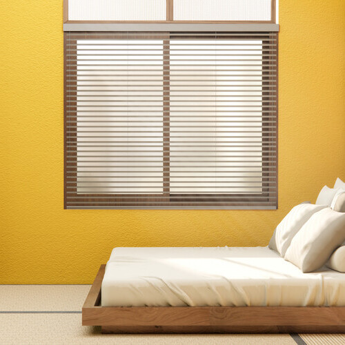 nice blinds in a bedroom with yellow walls