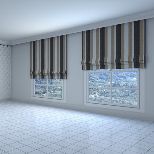 roman shades on windows in an empty room